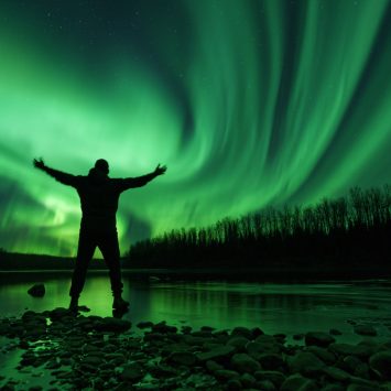 Northern lights / Aurora Borealis on the Sikanni River near Fort Nelson, BC.